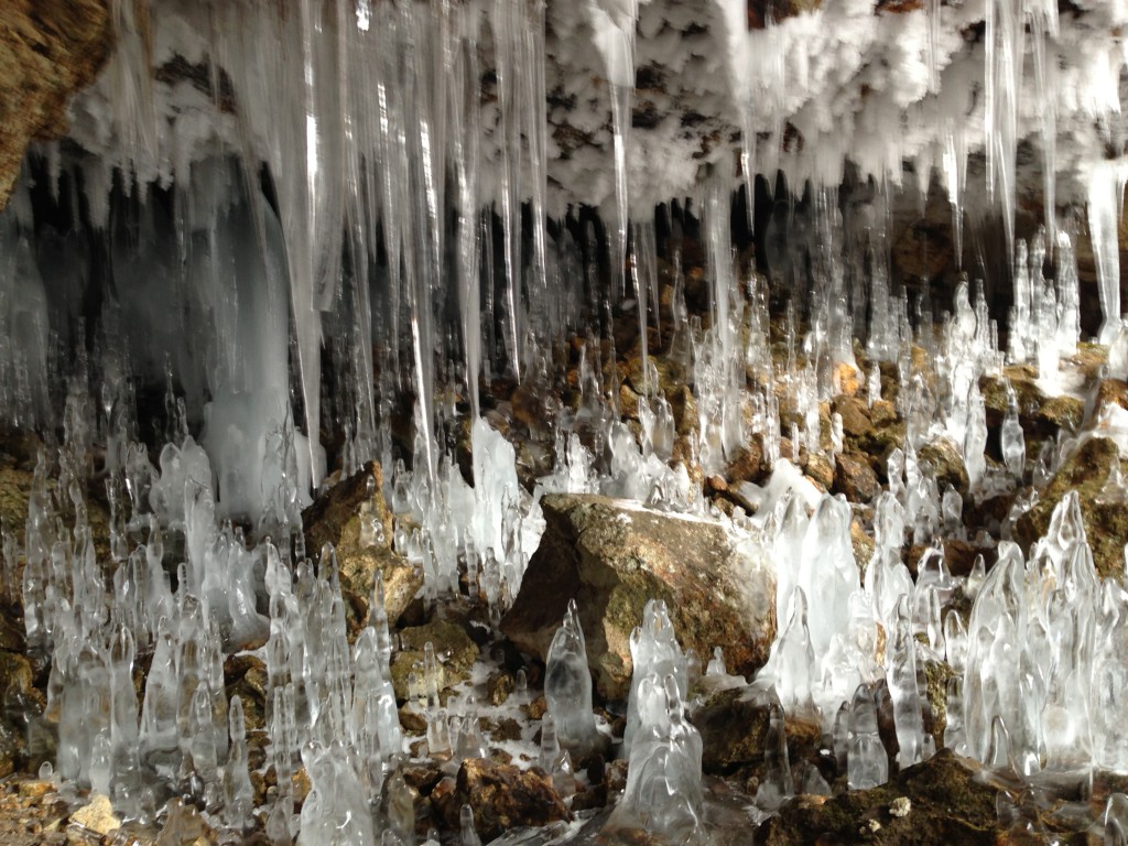 Frozen cascades of ice in both directions greeted us at the mouth of the cave.