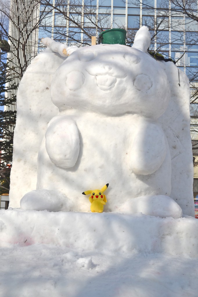 Pikachu (and Pikachu) get some sun. Several similar character parings could be found in the park.